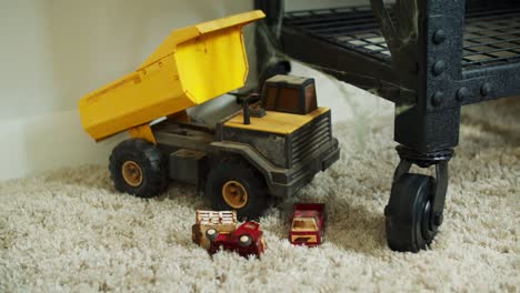 construction toy truck in empty childhood room