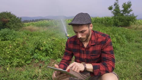 Farmer-using-tablet.