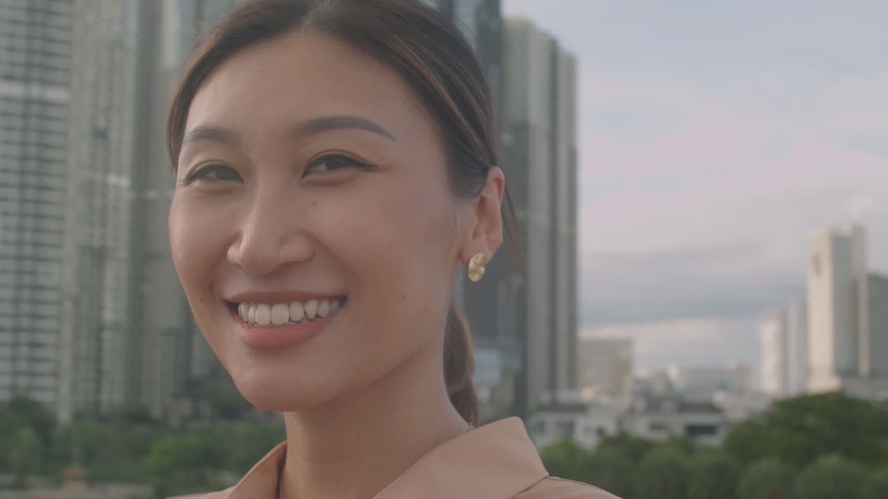 Portrait of Happy Asian Woman Outdoors