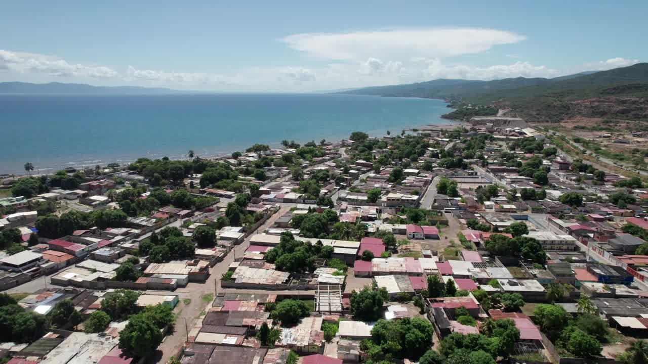 Aerial view of Cumaná cityscape by the sea, sunny day in Venezuela