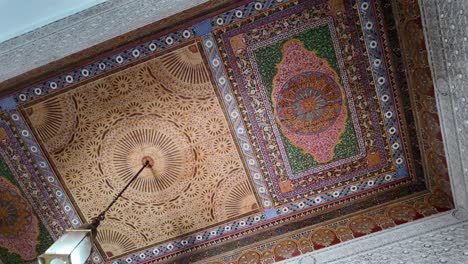 painted decorated ceiling wall in morocco home, riad inside medina