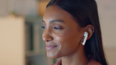 Indian-woman,-earphones-and-listening-to-music