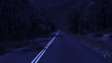 rear facing night driving point of view pov for interior car scene green screen replacement - night footage under a clear starry sky, on quiet deserted country roads with a slight righthand bend