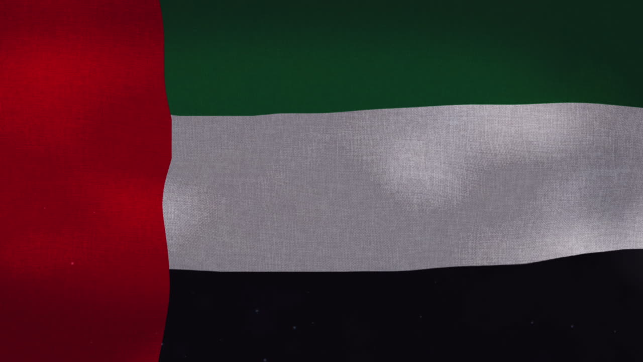la bandera nacional de los emiratos árabes unidos ondeando