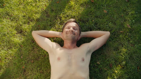 man relaxing in a park