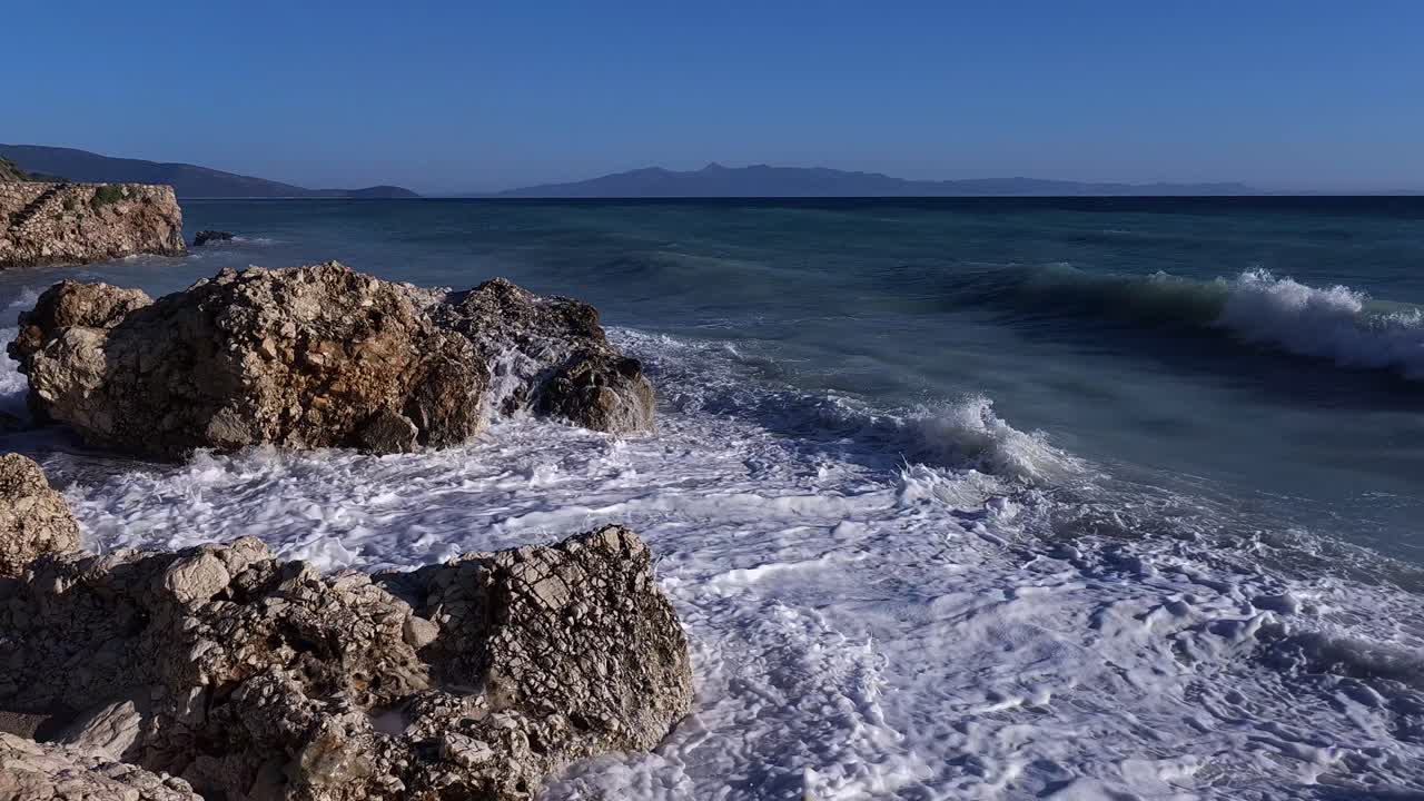 Angry Mediterranean Sea Waves Splashing Dramatically Against Rugged Cliffs - A Spectacular Display of Elemental Power, Nature's Fury