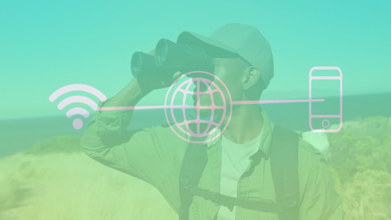 Using binoculars, man viewing digital connectivity icons in animation overlay scene