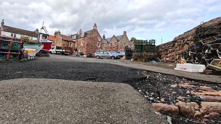 Harbor construction with fishing gear in Crail, Scotland