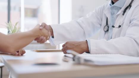 handshake, healthcare and doctor with his patient