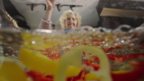 adding peppers to water