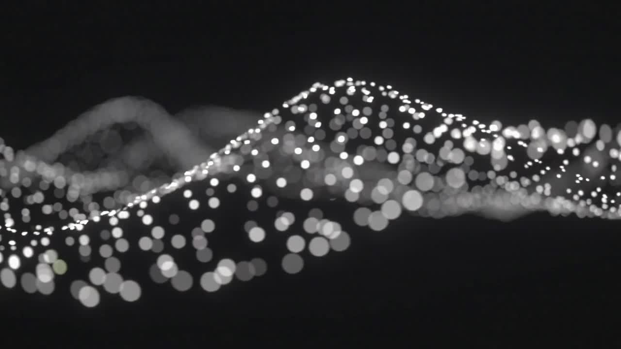 Shifting particle ribbon on frames, sliding in dark field with dotted crest, bokeh showing depth