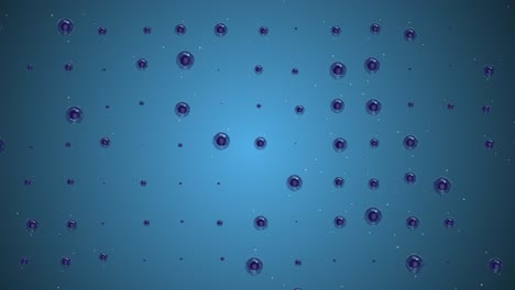 video en 4k de esferas de diferentes tamaños sobre un fondo azul.