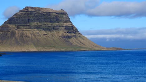 aerial view over fjord and mountains in iceland