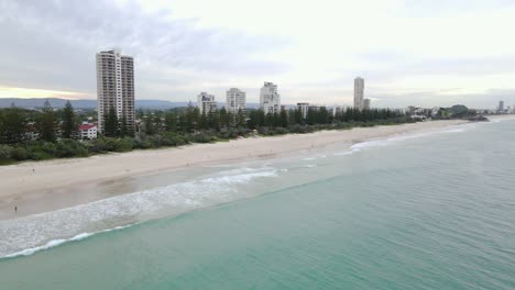 high-rise apartment buildings and burleigh beach in gold coast city, queensland, australia