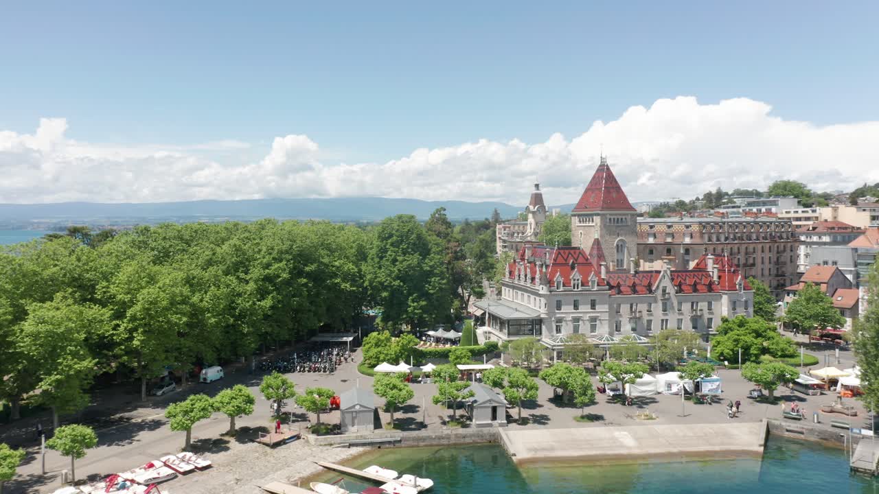 Wide aerial overview of Chateau d'Ouchy in Lausanne, Switzerland