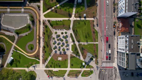 aerial top down central park in gdynia - slow fly over green place in the center of city