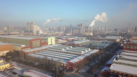 Sunny cold winter aerial flight over northern Chinese city, Harbin