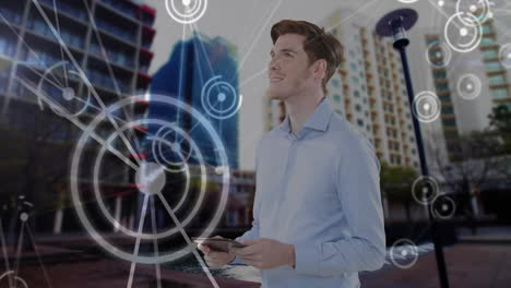 holding tablet, man surrounded by digital network connections animation over cityscape