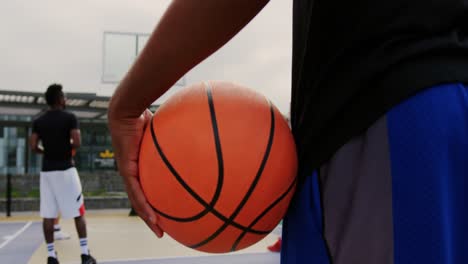 basketball player holding basketball 4k