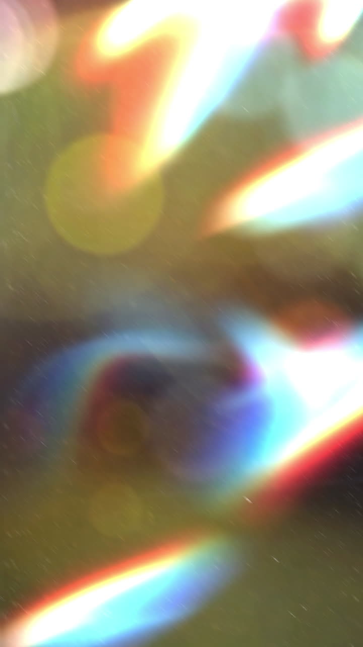 Sovrapposizione astratta vibrante di fughe di luce e bagliori dell'obiettivo.