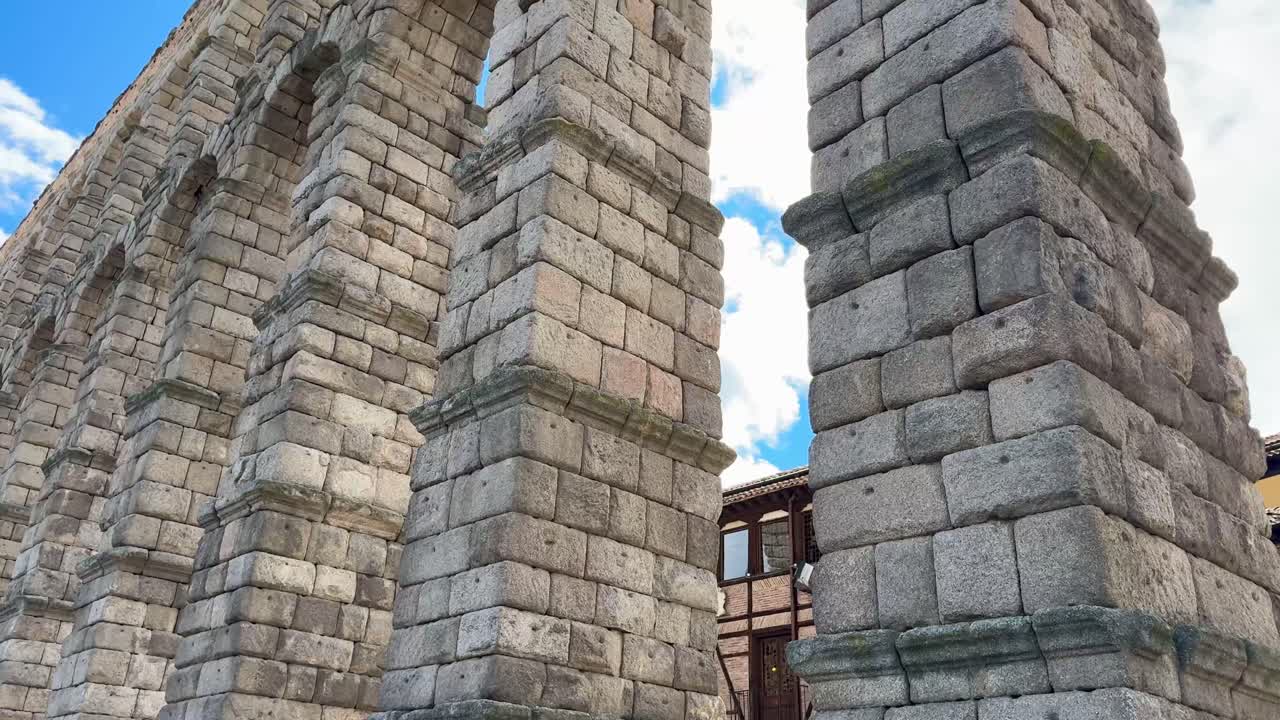 Ancient Segovia Aqueduct filmed during spring.
