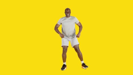 a strong african man doing quaterback exercises