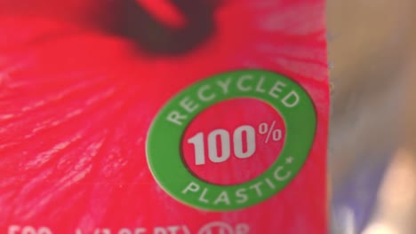 100% recyclable plastic certification on a drinking water bottle