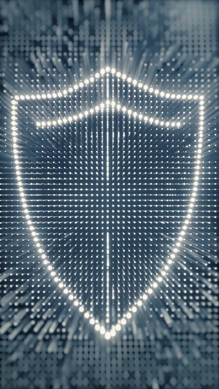 Digital Shield Symbol Forming from Glowing Particles