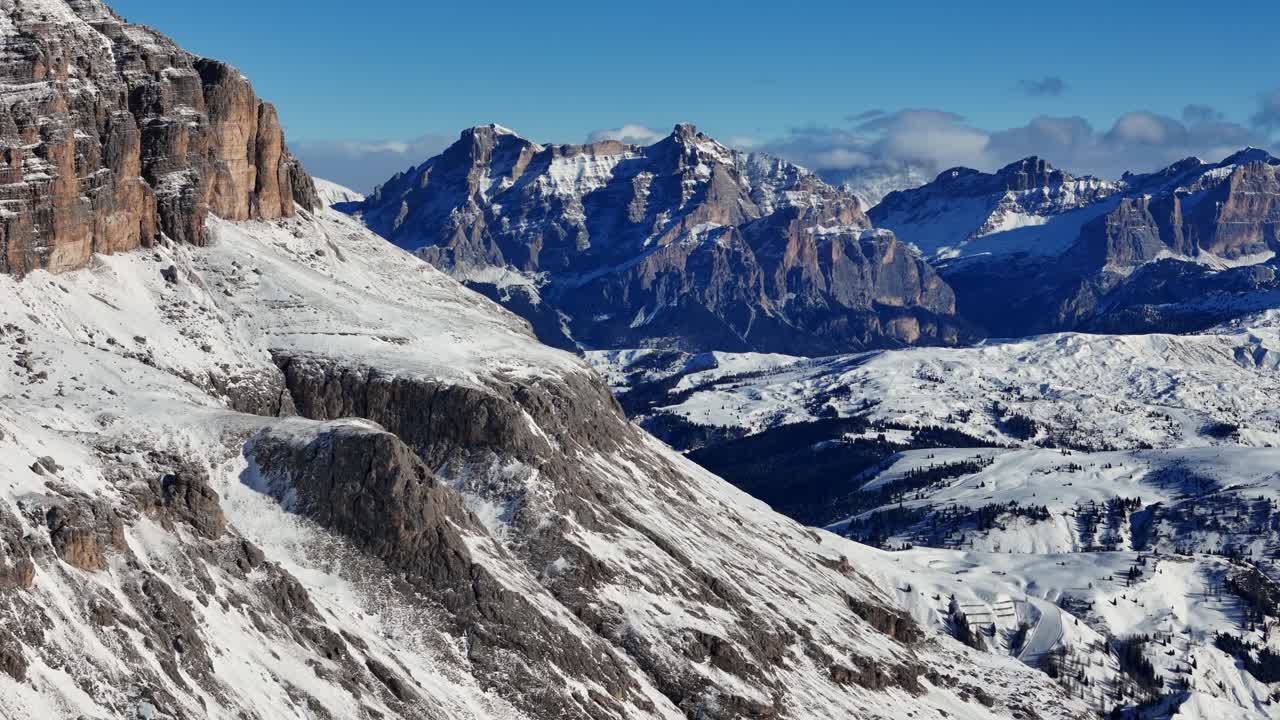 Reveal shot of rock formation in background, shot in Italian Dolomites (drone footage)
