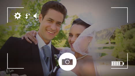 animation of camera screen over caucasian married couple at wedding