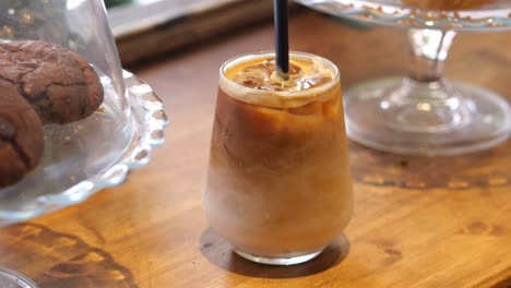 iced latte on a wooden table