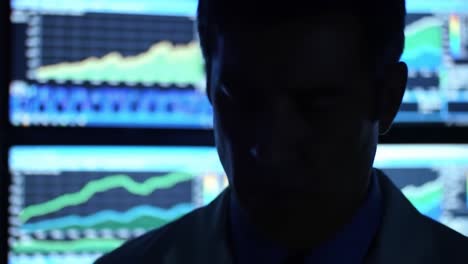 a mysterious figure in a laboratory setting analyzing data trends against biometric monitoring screens, merging technology with scientific insight