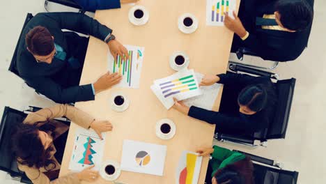 Business-people-group-meeting-shot-from-top-view