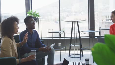 Colleagues-discussing-in-the-office