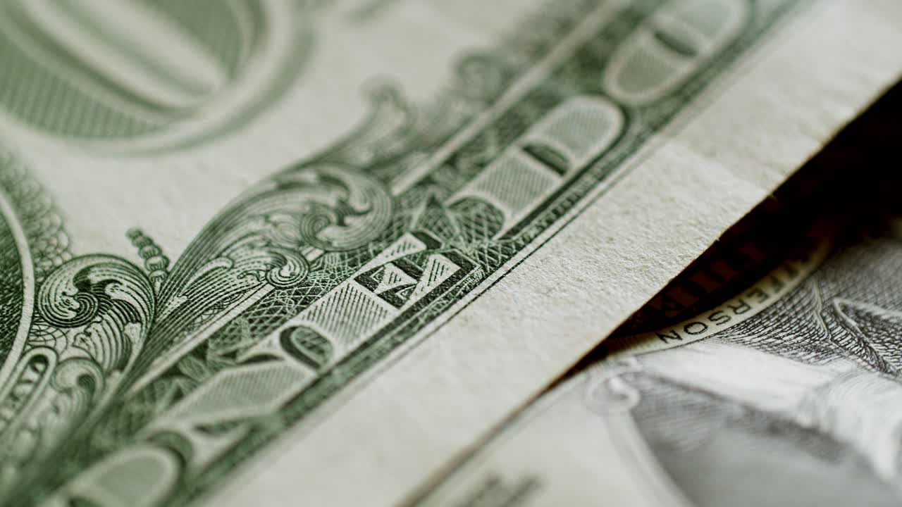 a close-up of a one dollar bill bank note of the United States of America