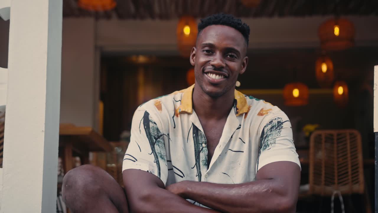 Man Sitting Outside on a Porch