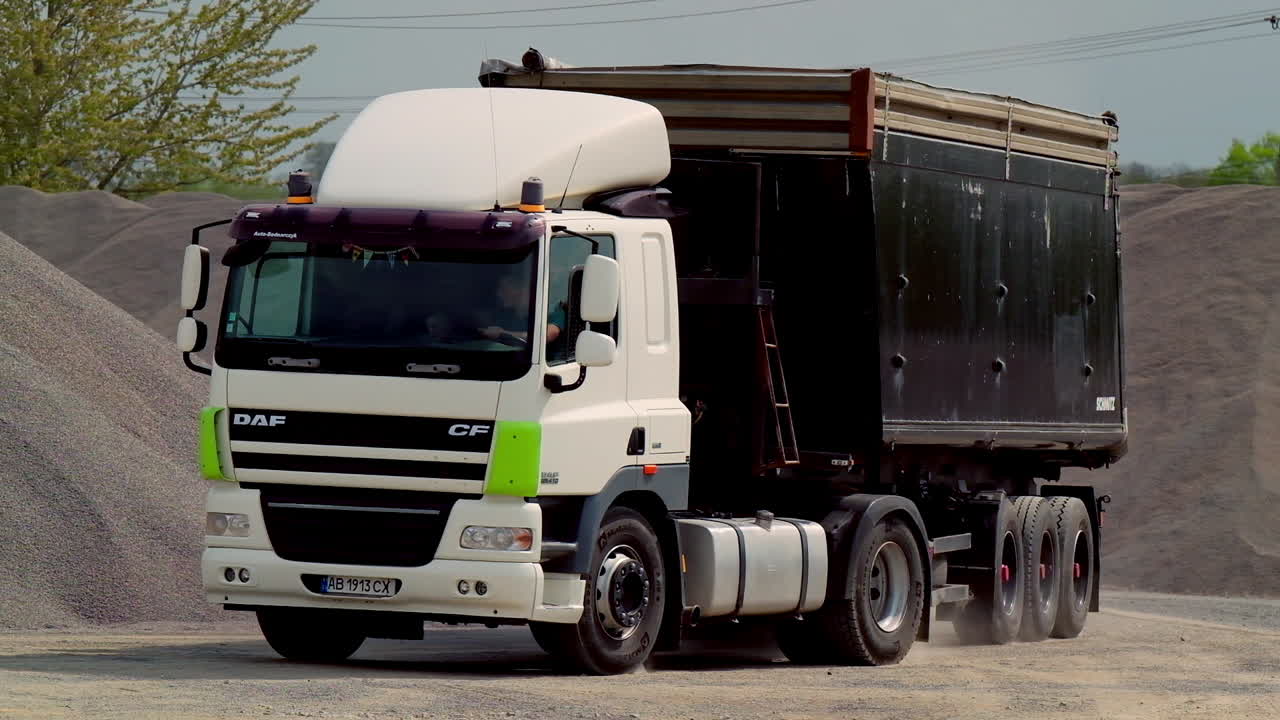 Transportation of crushed stone. Truck transports crushed stone in the storage