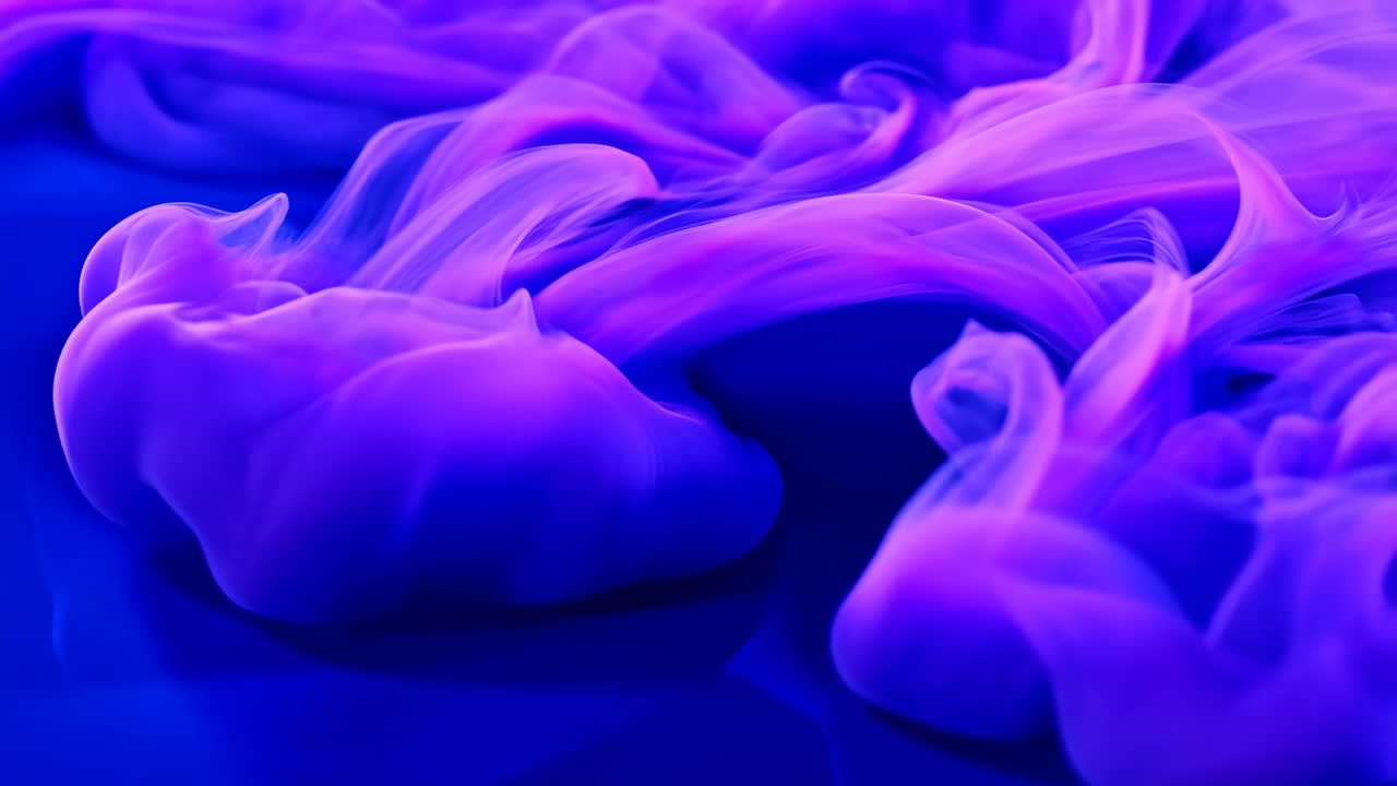 Vibrant Purple and Pink Ink Dispersion in Blue Liquid