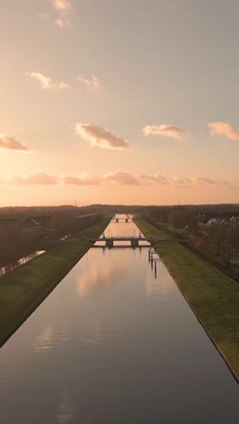 canal bridge at sunset