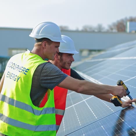 workers installing solar panels