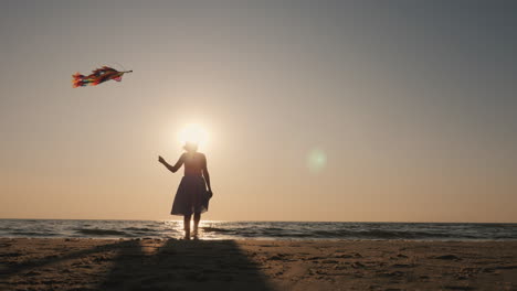 a young family actively spends time together - they play kites