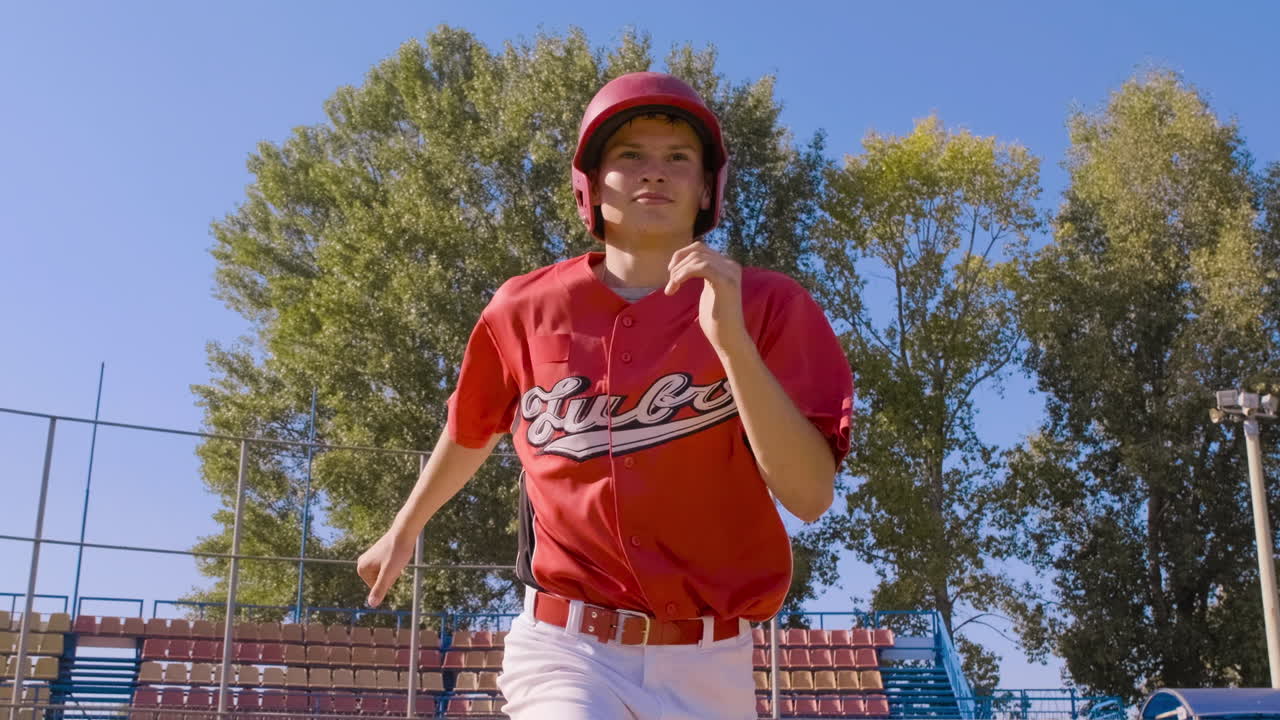 Youth baseball practice sessions taking place under clear blue skies and sunshine