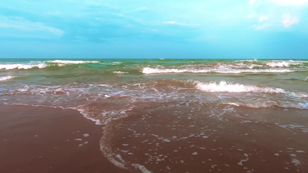 Rising tide on cloudy day. Static