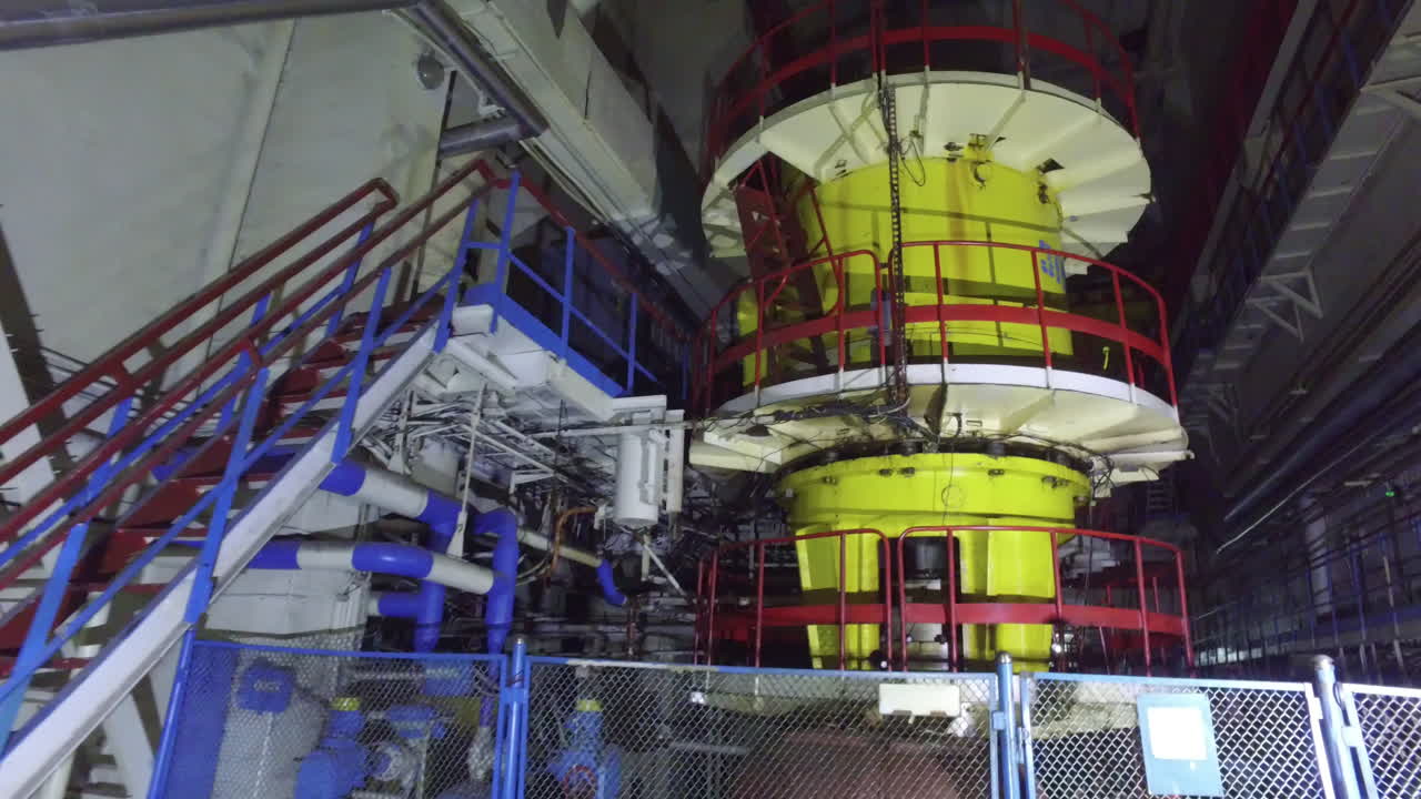Industrial Equipment Inside The Turbine Hall Of The Chernobyl Nuclear Power Plant In Ukraine. Low Angle Shot