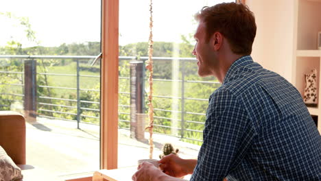 handsome young man relaxing having coffee