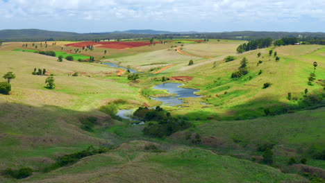 aerial view of green farmland in atherton tablelands region, queensland, australia - drone shot