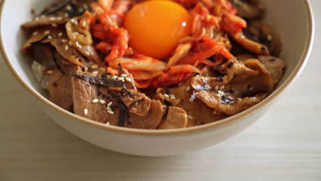 pork bulgogi rice bowl with kimchi and korean pickled egg - korean food style