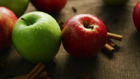 Apples and spices on table 