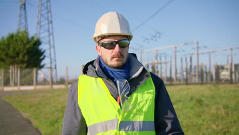 shift worker wearing ppe ensuring own safety at electrical installation