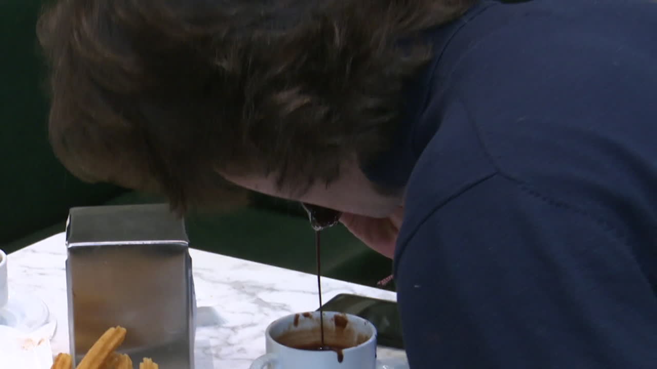 Enjoying Churros with Hot Chocolate